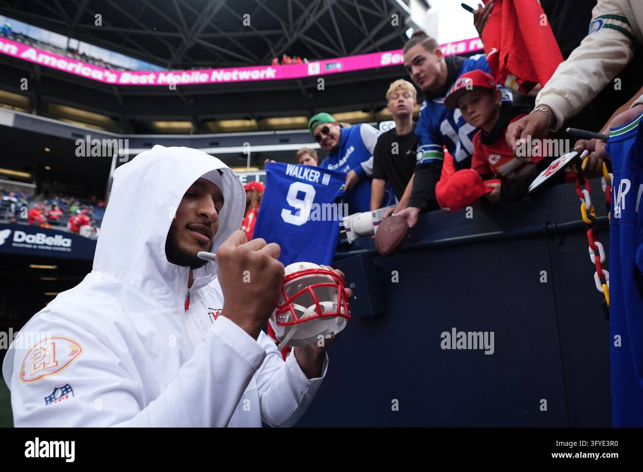 Kansas City Chiefs defensive back Jaden Hicks signs autographs before ...