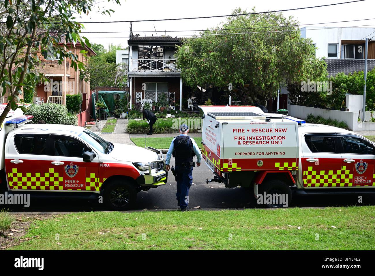 Police and Fire and Rescue officers at the scene of a suspicious house ...