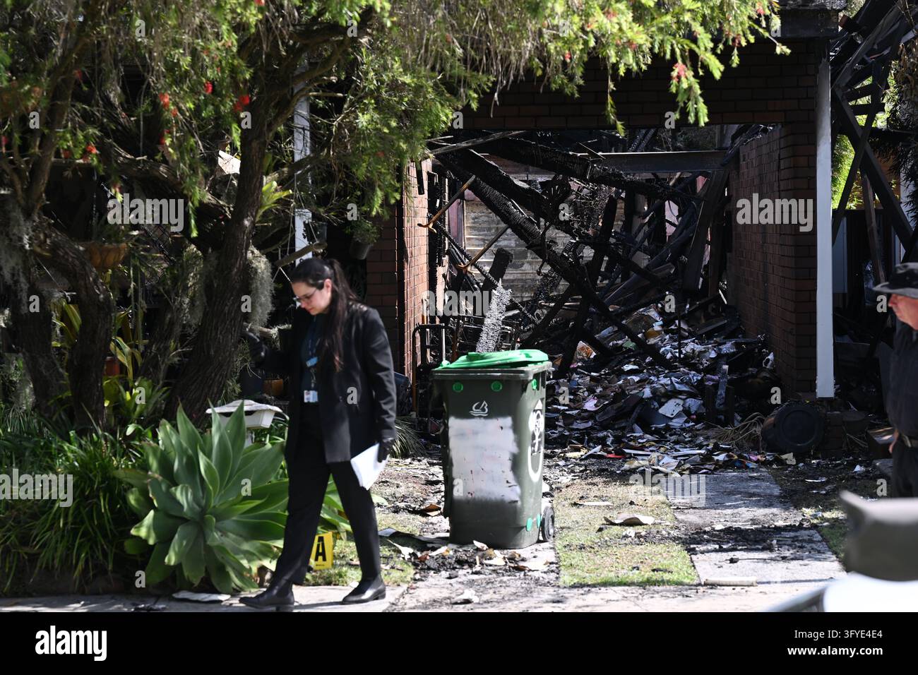 Police and Fire and Rescue officers at the scene of a suspicious house ...