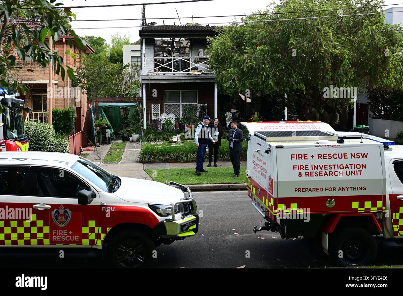 Police and Fire and Rescue officers at the scene of a suspicious house ...