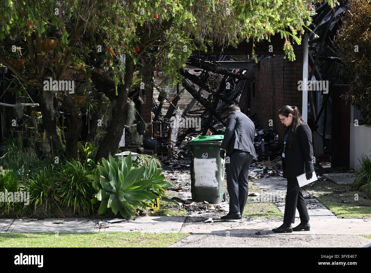 Police and Fire and Rescue officers at the scene of a suspicious house ...