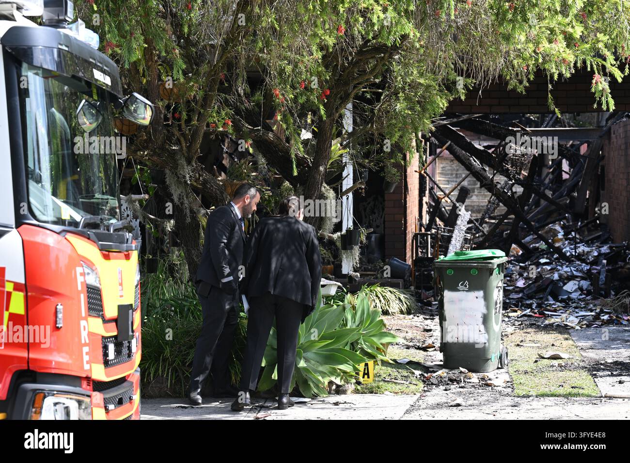 Police and Fire and Rescue officers at the scene of a suspicious house ...