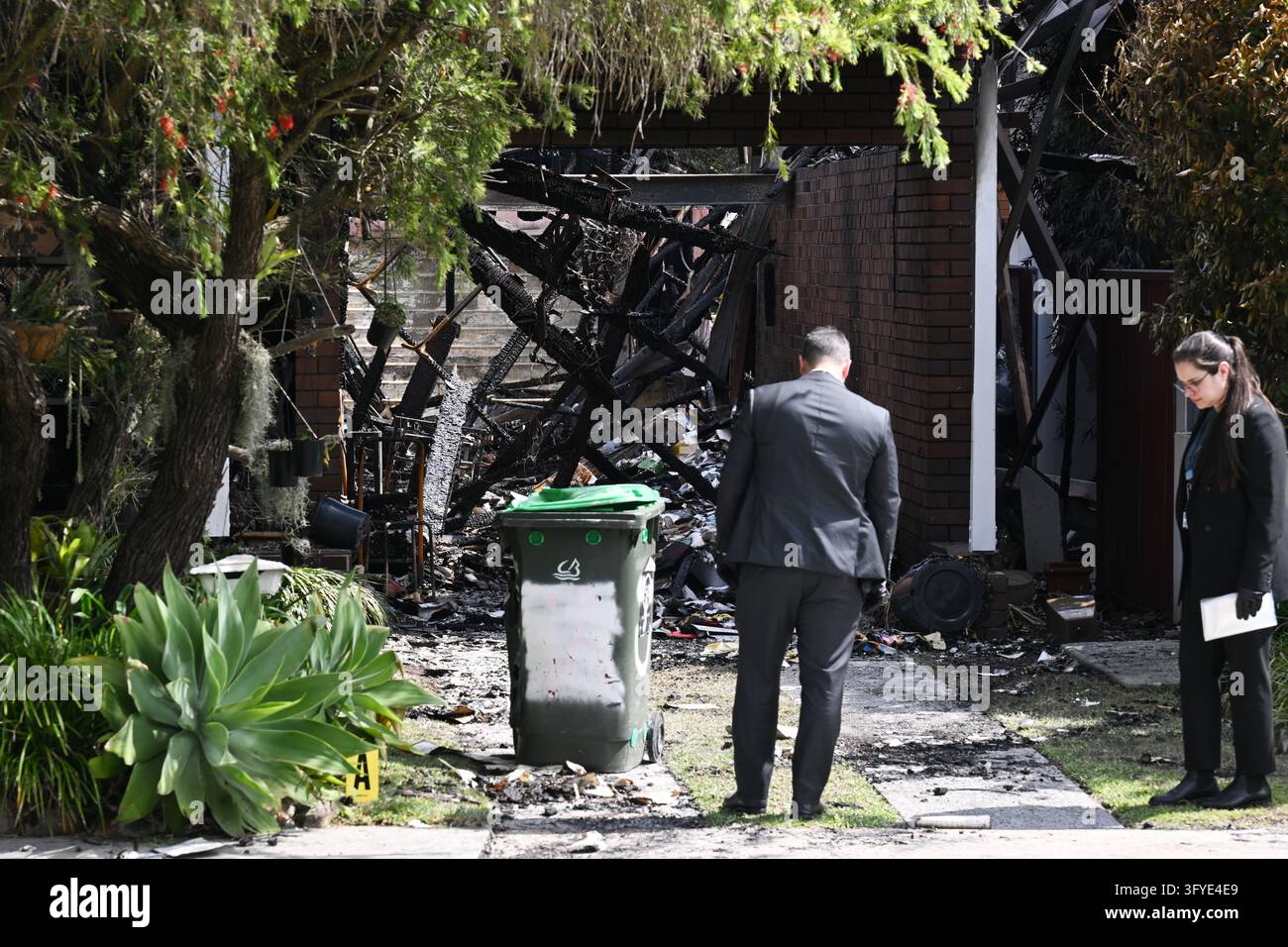 Police and Fire and Rescue officers at the scene of a suspicious house ...
