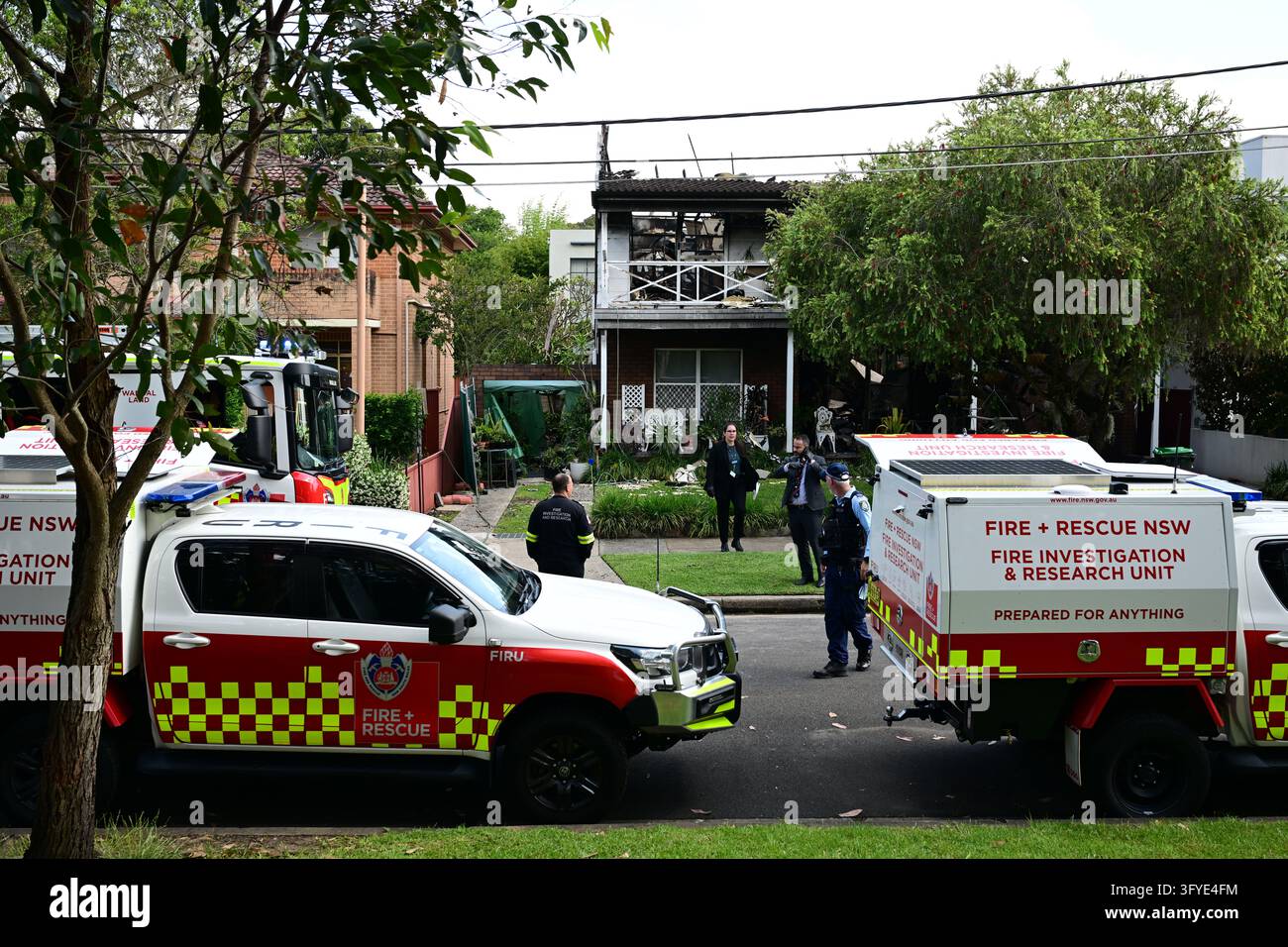 Police and Fire and Rescue officers at the scene of a suspicious house ...