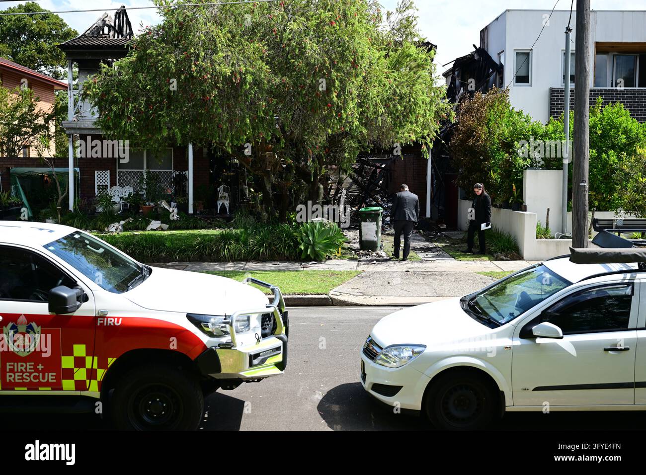 Police and Fire and Rescue officers at the scene of a suspicious house ...