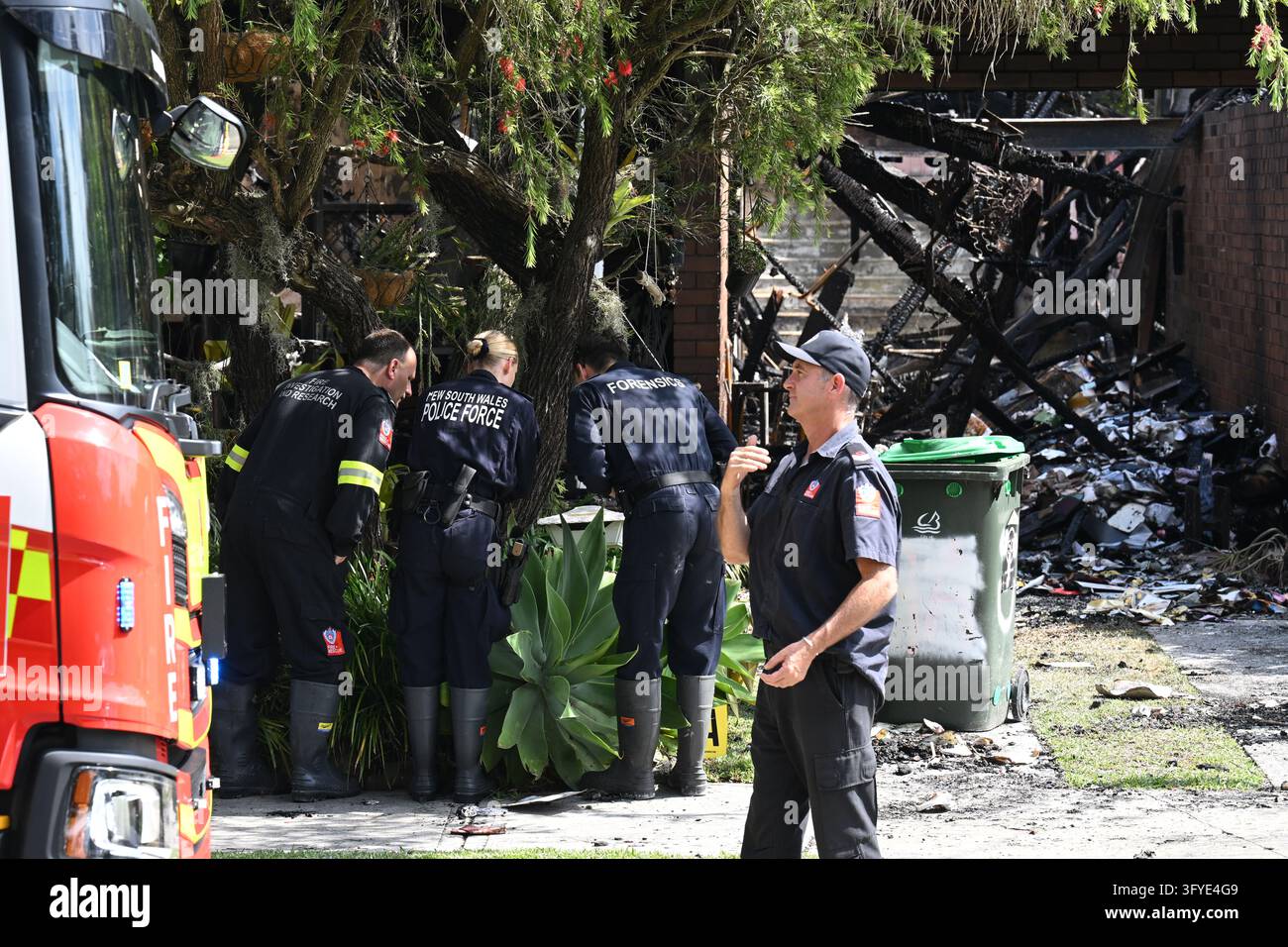 Police and Fire and Rescue officers at the scene of a suspicious house ...