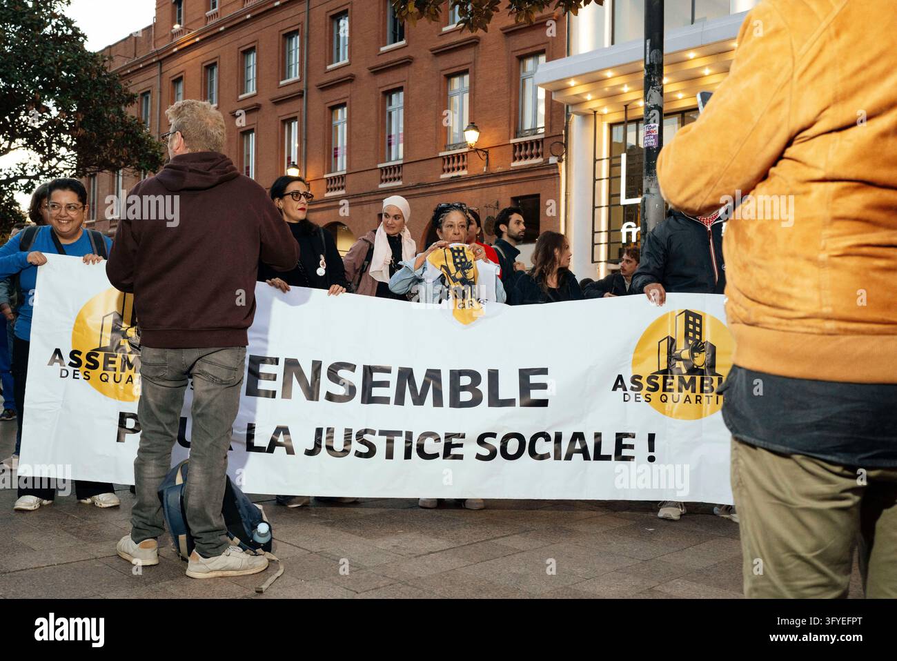The banner reading - Neighborhood Assembly, Together for Social Justice ...