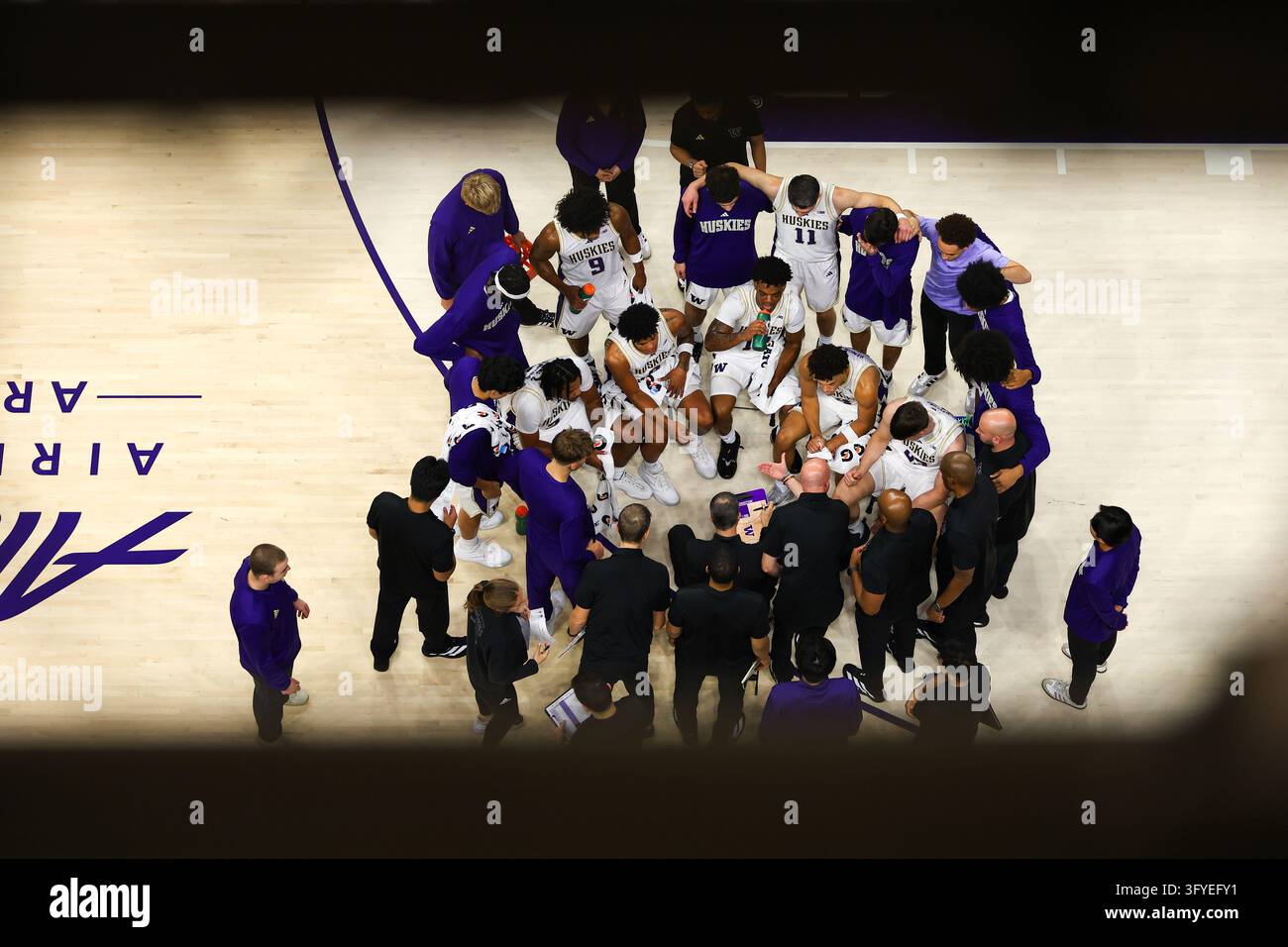 SEATTLE, WA - OCTOBER 25: Players from the Washington Huskies huddle ...