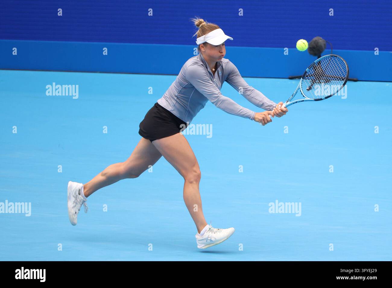 October 27, 2026, Tokyo, Japan: Yulia PUTINTSEVA (KAZ) returns a shot ...