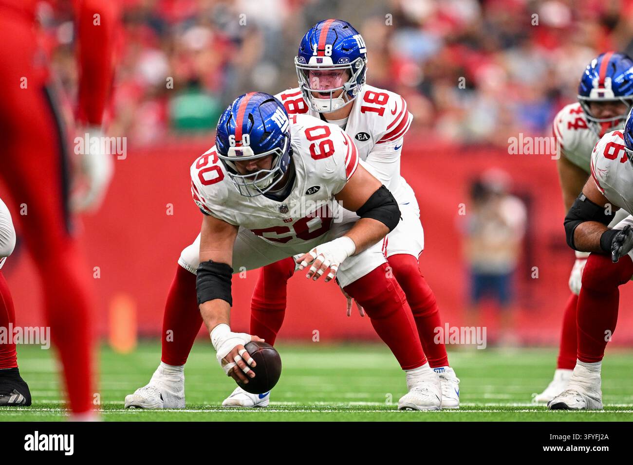 New York Giants quarterback J.J. McCarthy (18) calls a play against the ...