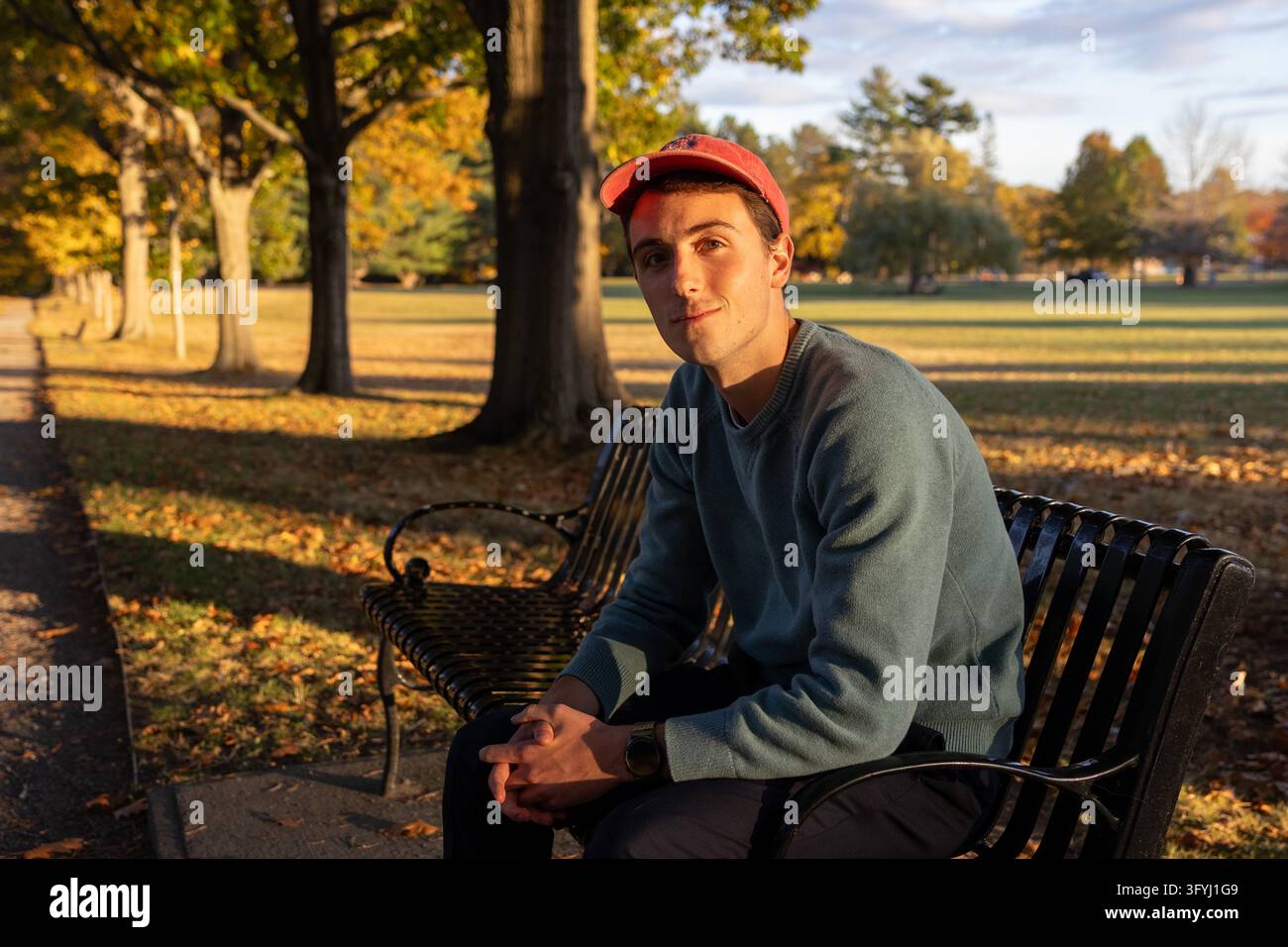 Jonathan Bisson, a senior at Brunswick High School, sits on a bench in ...