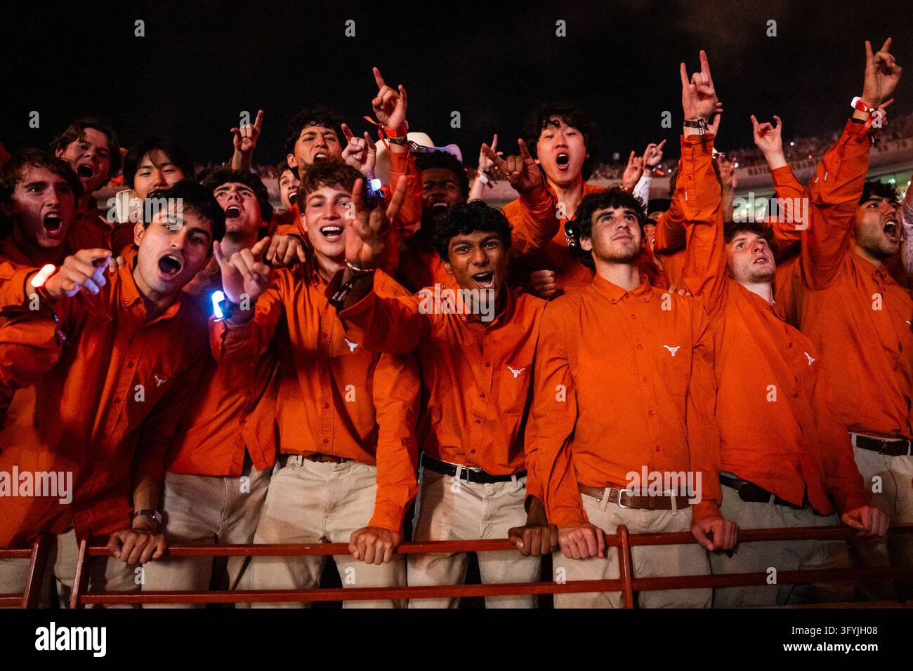 Fans in the Texas student section dance in the third quarter of an NCAA ...