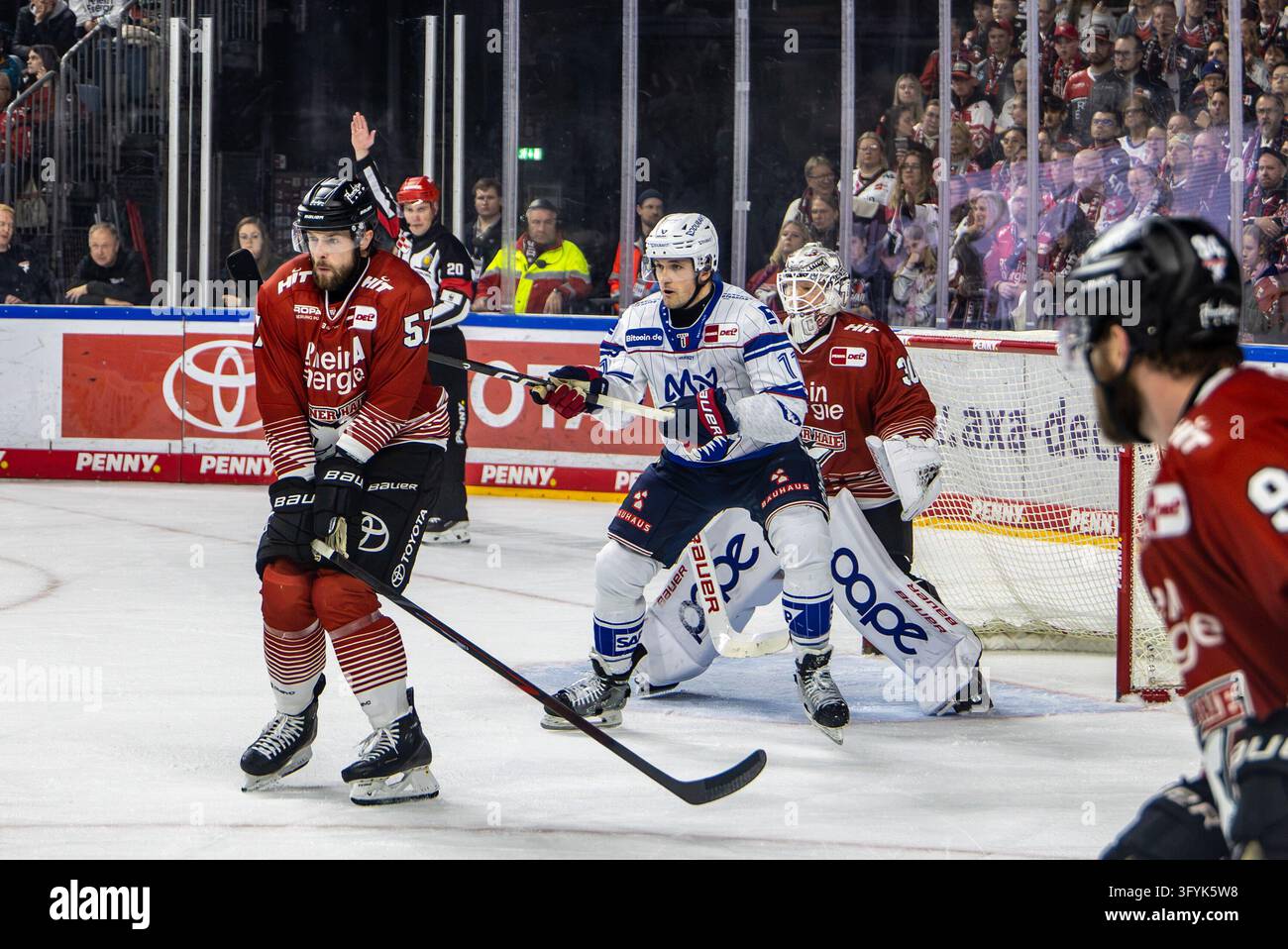 Kristian Reichel (Adler Mannheim, #11) in front of the goal by Janne ...