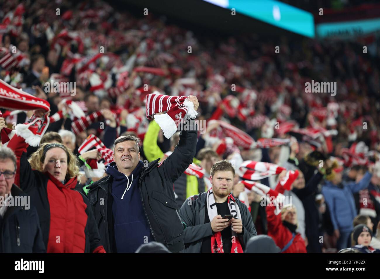 Fans [supporters], friendly, atmosphere, colorful, national colors ...
