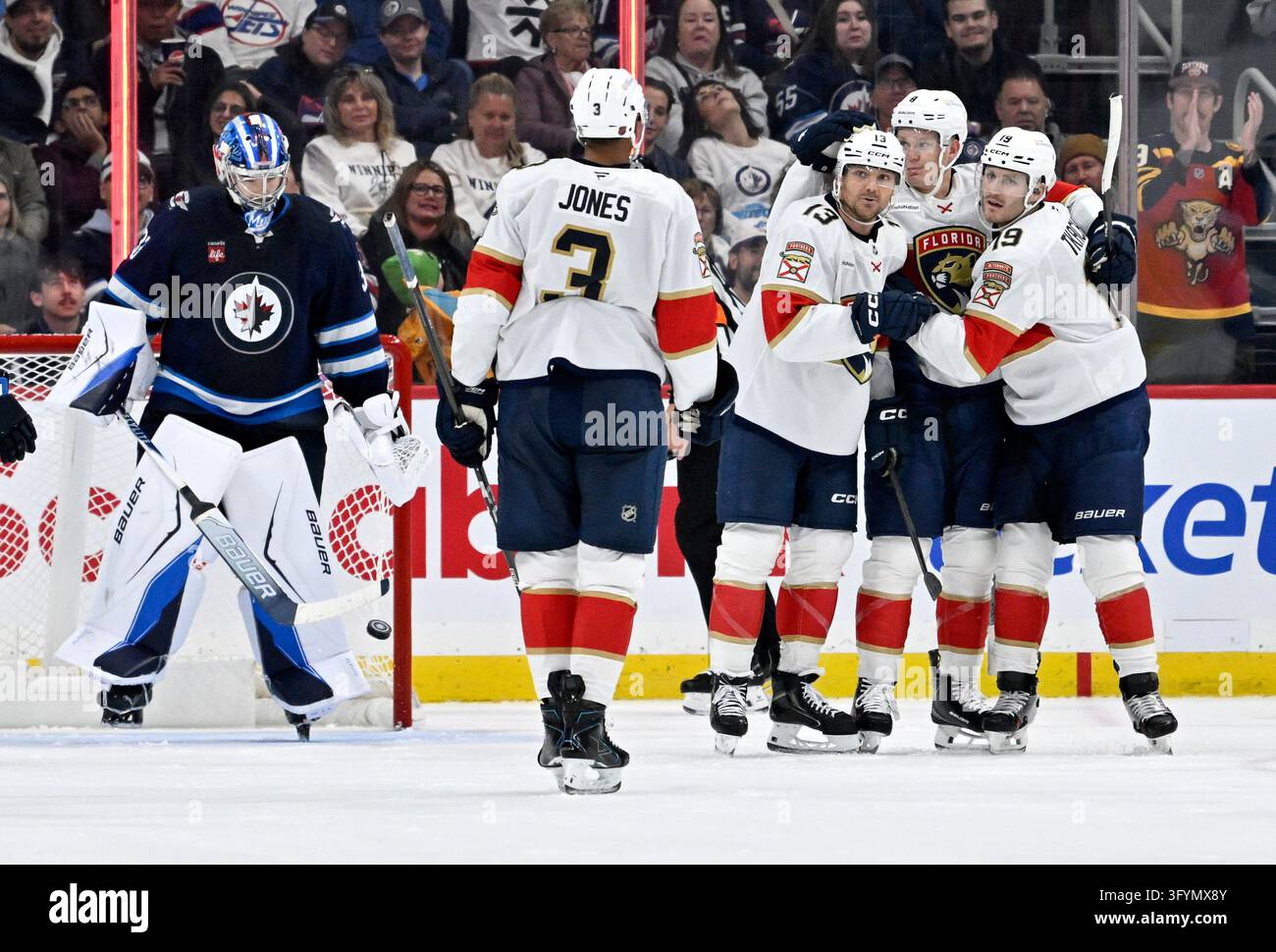 Florida Panthers' Sam Reinhart (13) celebrates his goal on Winnipeg ...