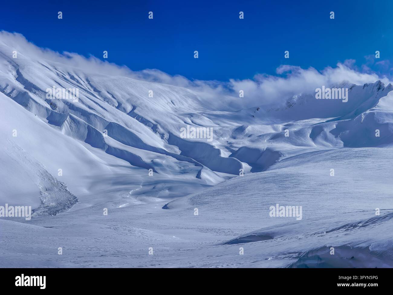 Breathtaking winter scenery of pristine snow-covered slopes and ...