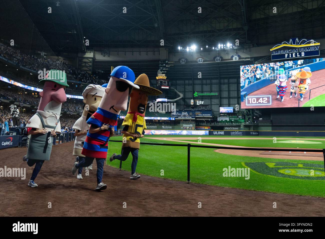 The Famous Racing Sausages race during a watch party as the Milwaukee ...