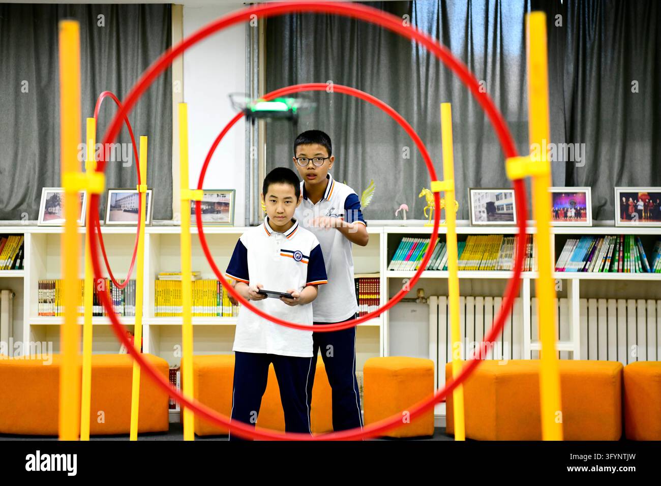 (261028) -- JINAN, Oct. 28, 2026 (Xinhua) -- Students fly a drone ...