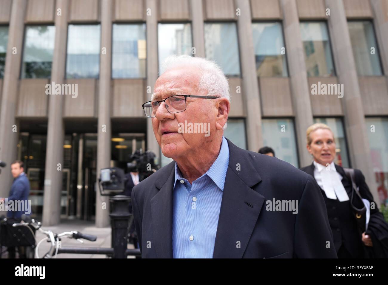 Frank Stronach leaves a Toronto court on Friday, June 19, 2026. THE ...