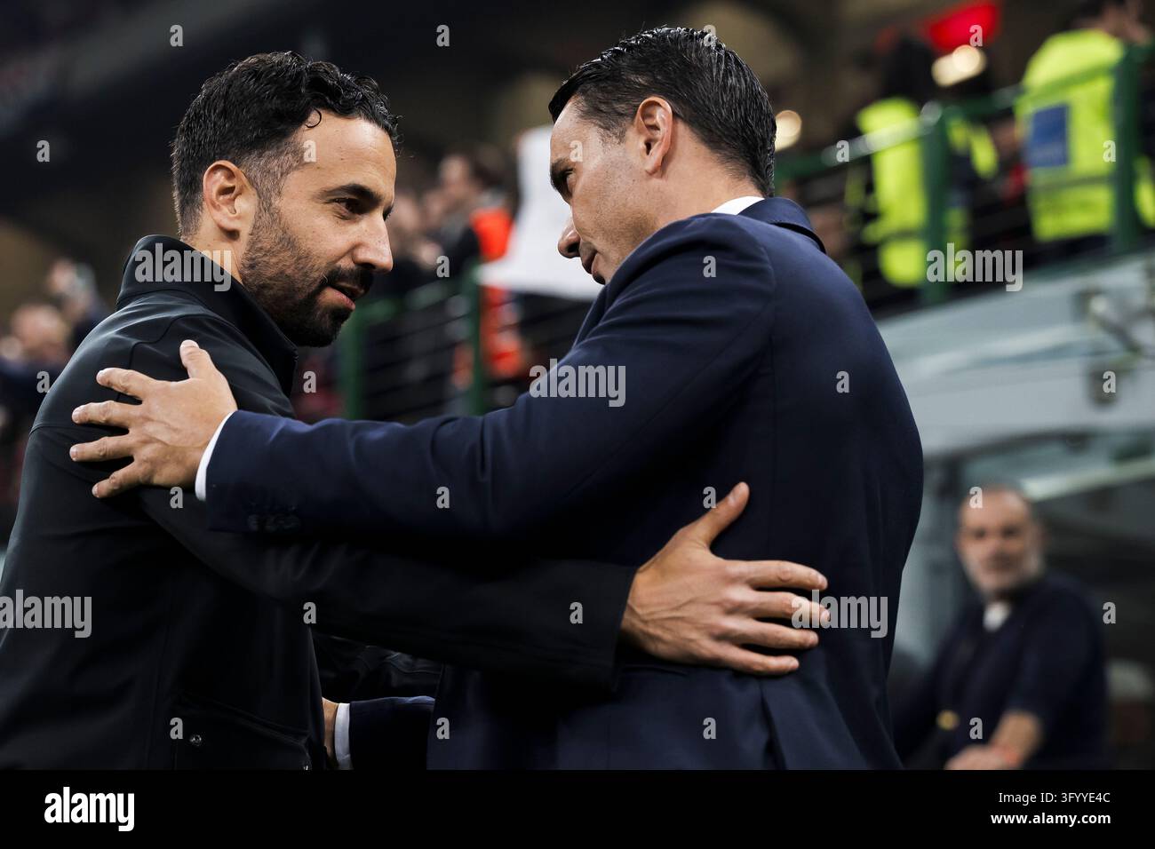 Team Hug Vector Ruben Amorim, head coach of AC Milan, hugs Raffaele Palladino, head ...