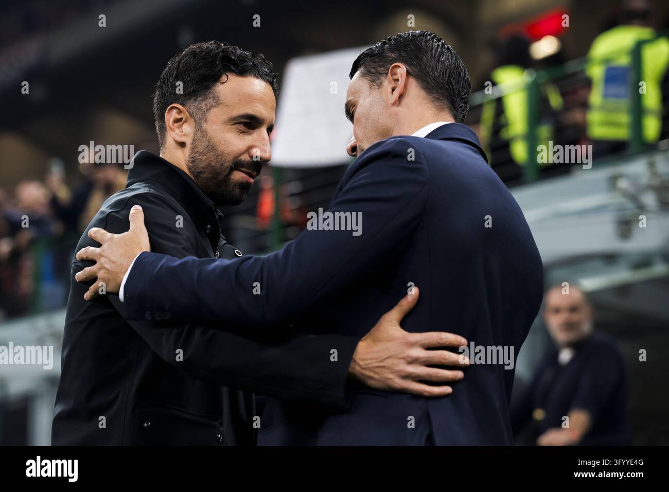Team Hug Vector Ruben Amorim, head coach of AC Milan, hugs Raffaele Palladino, head ...