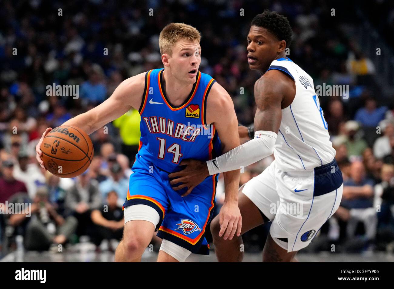 Oklahoma City Thunder guard Bennett Stirtz drives past Dallas Mavericks ...