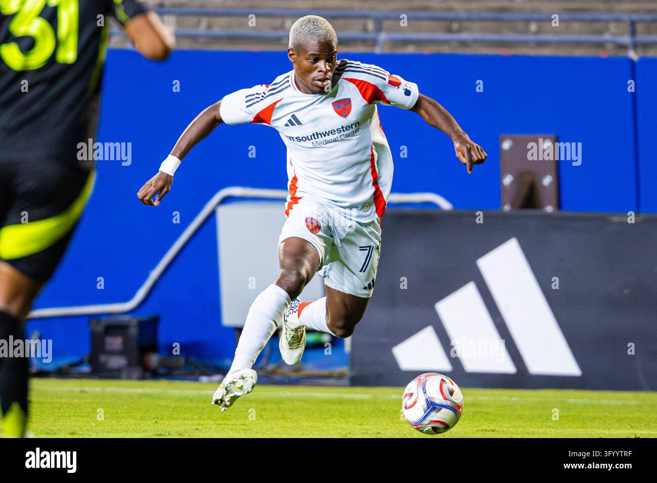 FC Dallas midfielder Bernard Kamungo (77) dribbles the ball during the ...