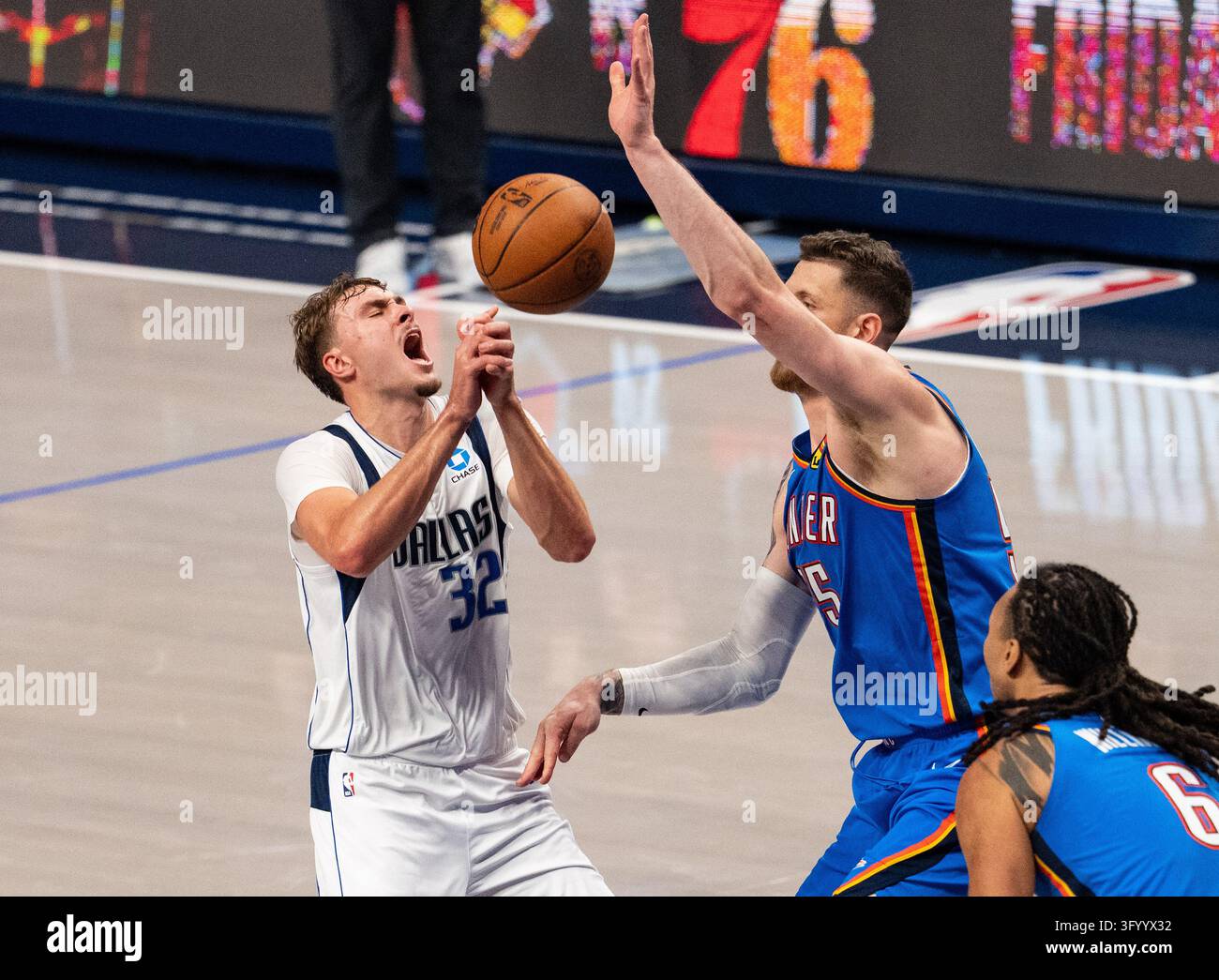 Dallas Mavericks forward Cooper Flagg loses the ball as he is fouled by ...