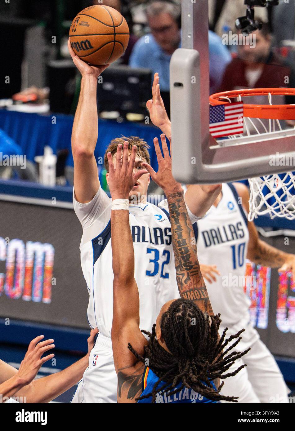 Dallas Mavericks forward Cooper Flagg shoots over Oklahoma City Thunder ...