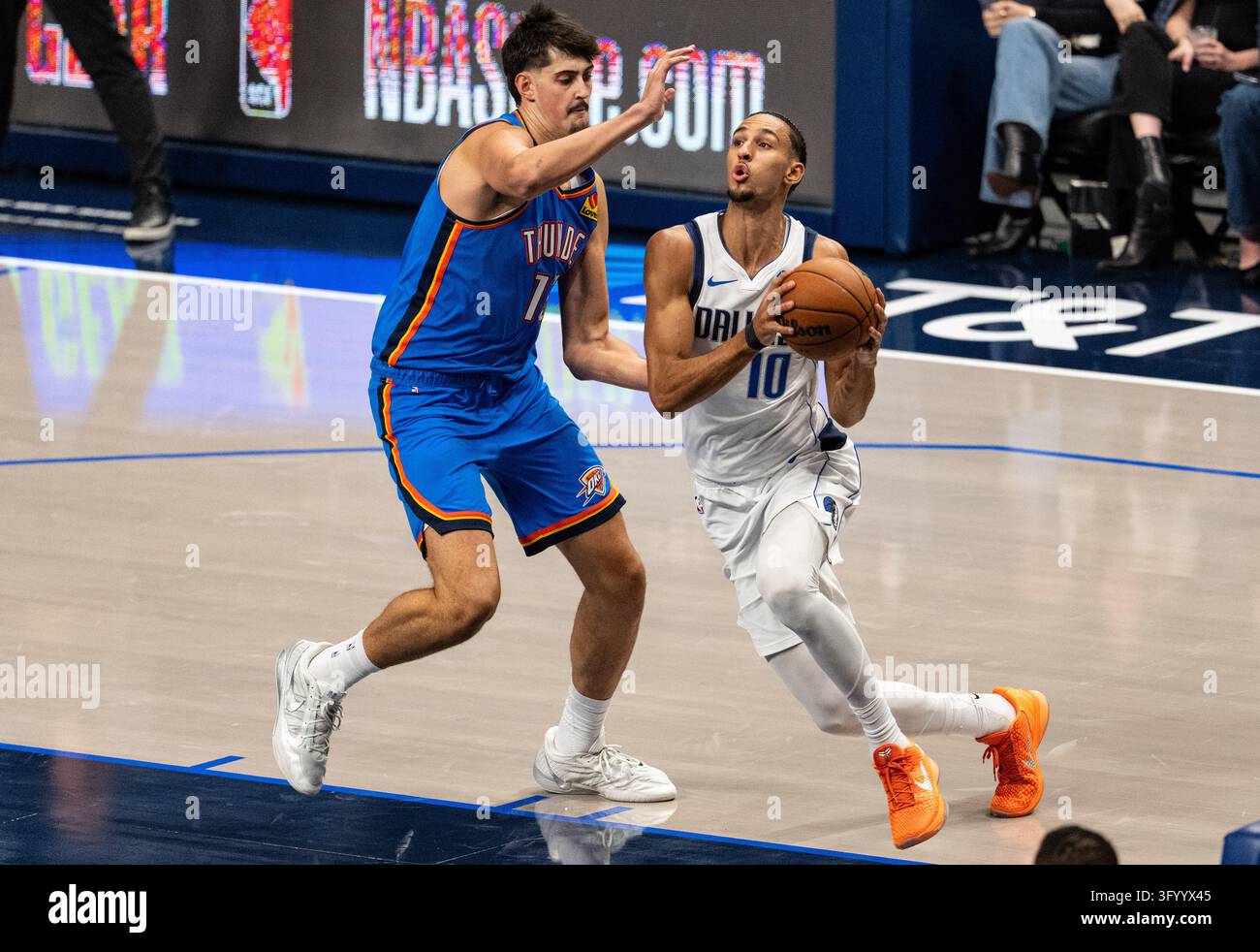 Dallas Mavericks forward Zaccharie Risacher drives past Oklahoma City ...