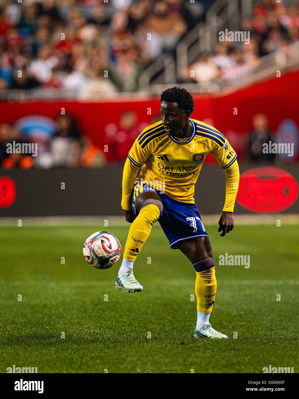 Orlando City SC midfielder Iván Angulo (77) controls ball during the ...