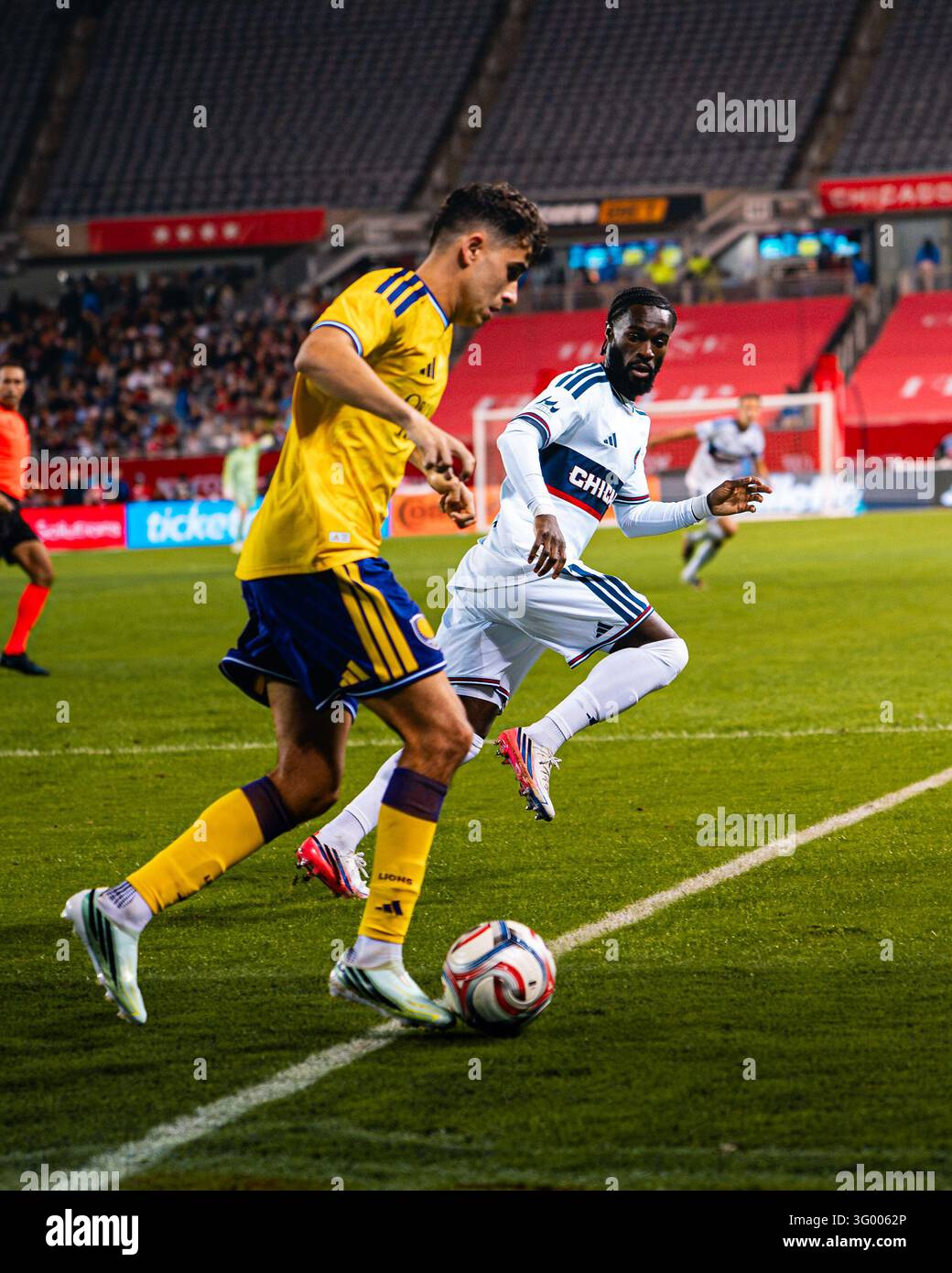 Chicago Fire FC forward Jonathan Bamba (19) watches ball and defends ...