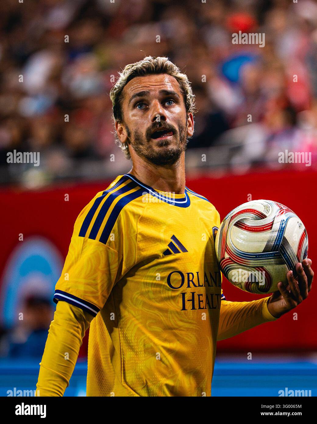 Orlando City SC forward Antoine Griezmann (7) walks with ball to take ...