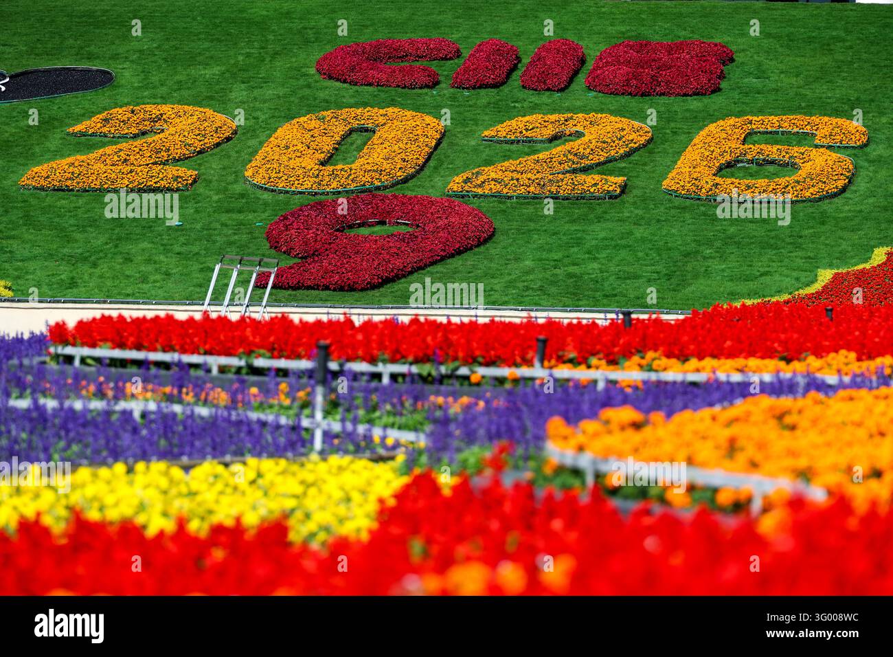 Floral displays featuring mascot Jinbao are set up at the South Square ...