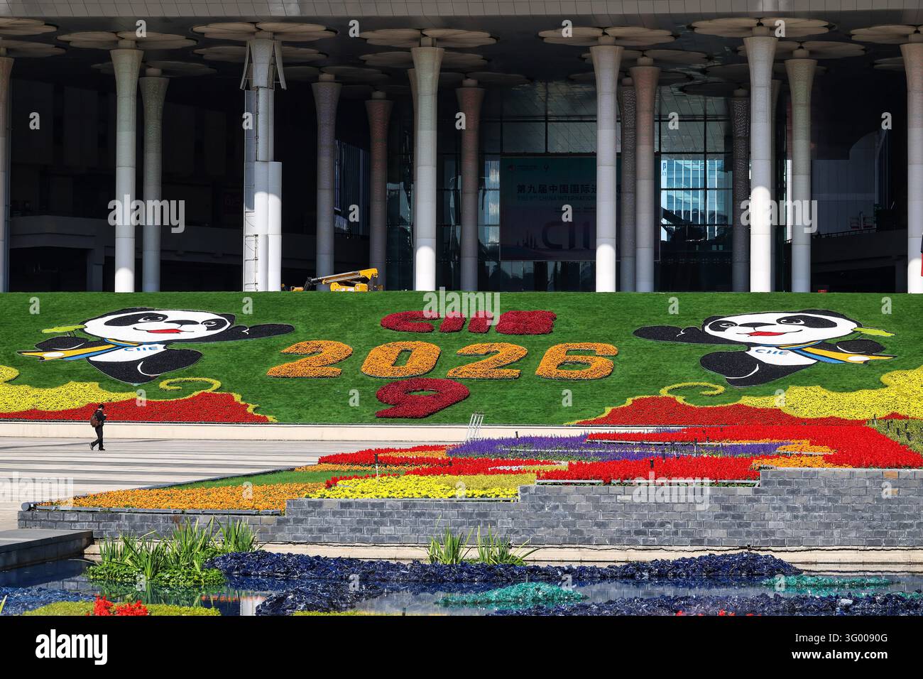Floral displays featuring mascot Jinbao are set up at the South Square ...