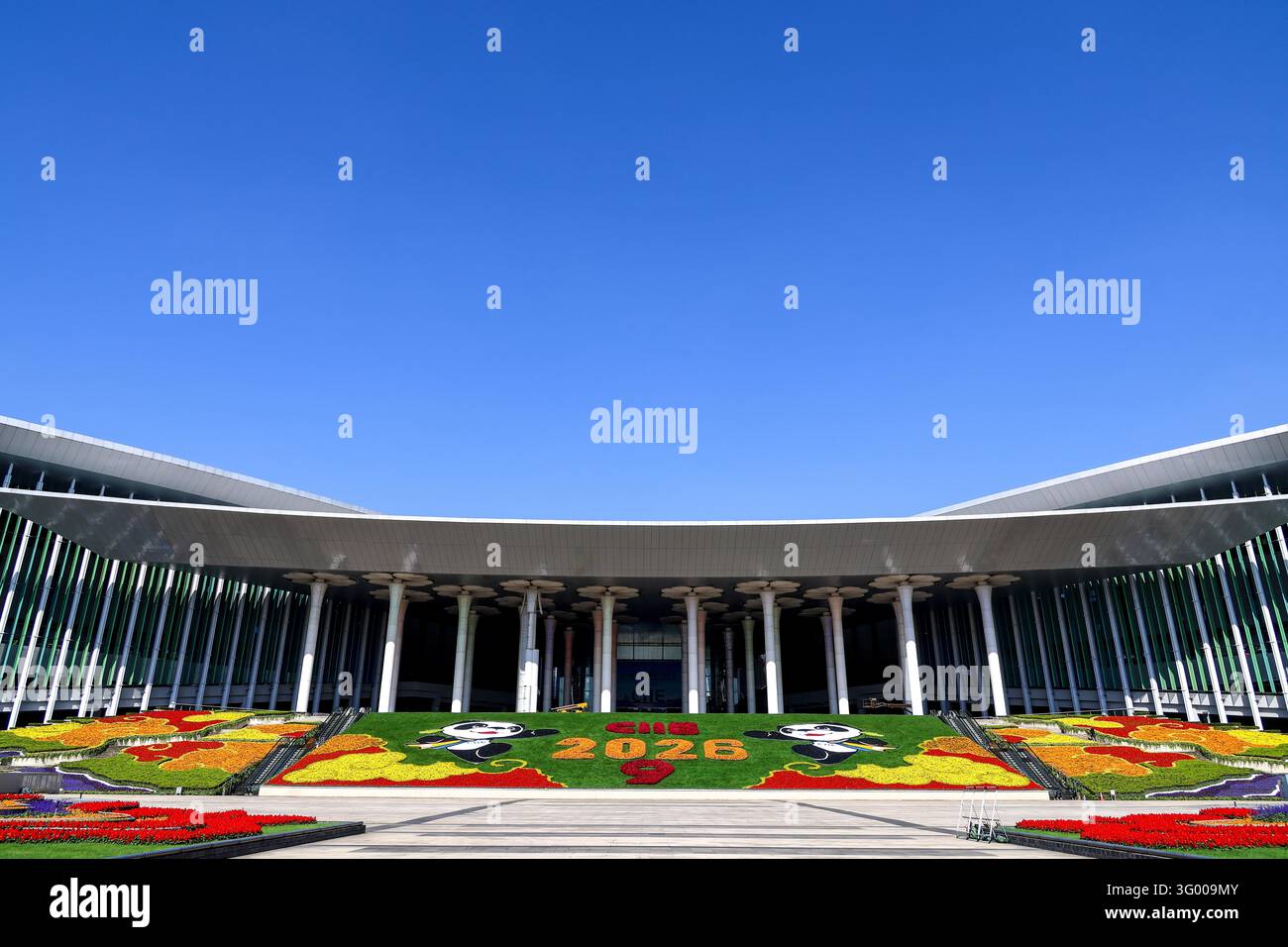 Floral displays featuring mascot Jinbao are set up at the South Square ...