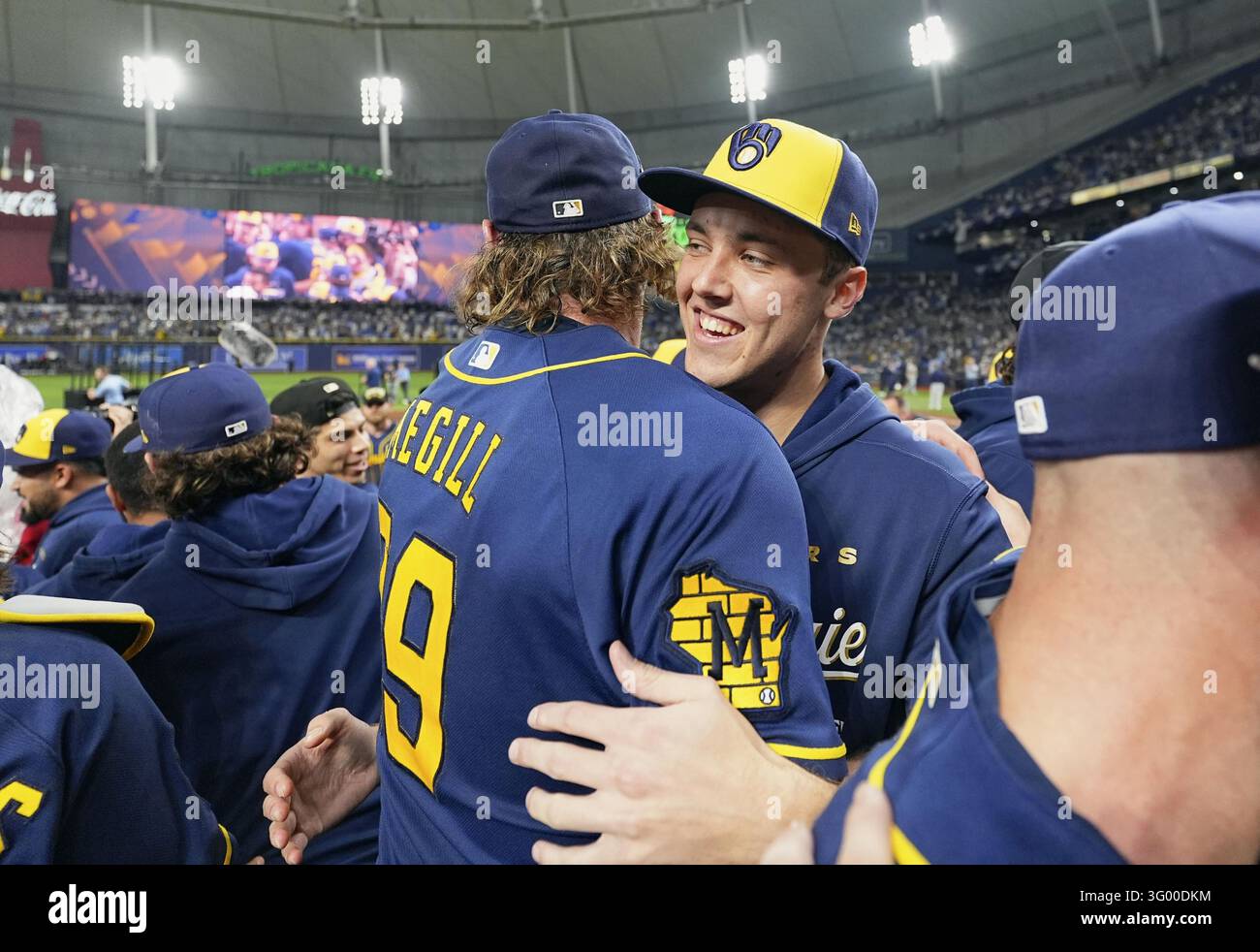 Team Hug Vector Milwaukee Brewers pitcher Trevor Megill (L) hugs pitcher Jacob ...