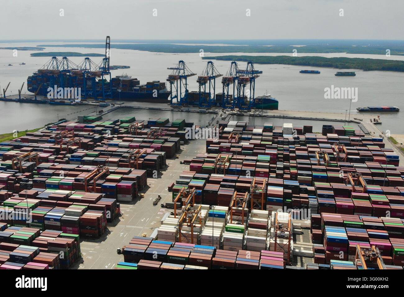 Stacking Cargo Signage Cargo containers are stacked at a port in the Thi Vai complex in Ho Chi ...