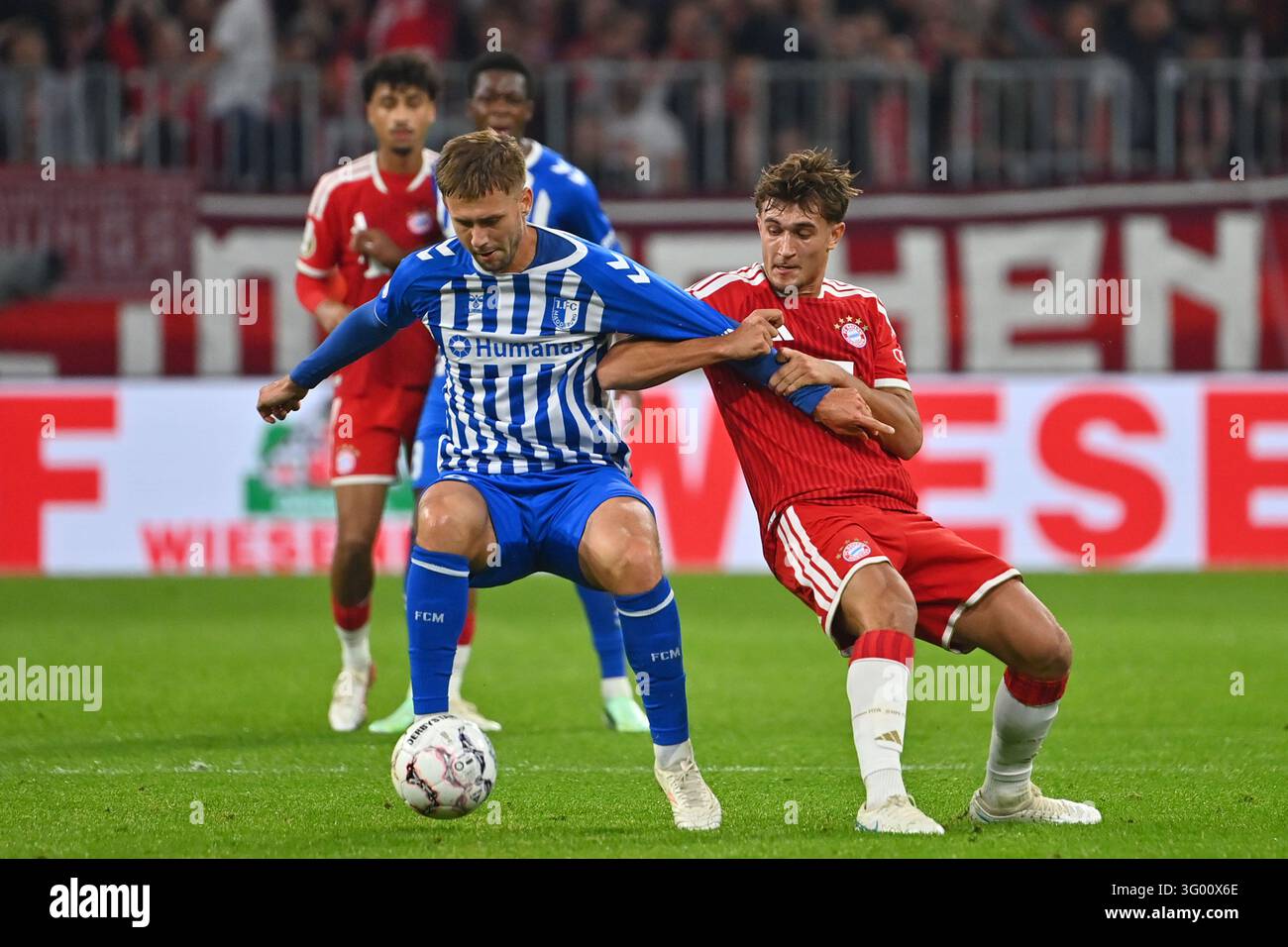 Simon Round Tom Bischof (FC Bayern Munich), action, duel against Torben Muesel ...