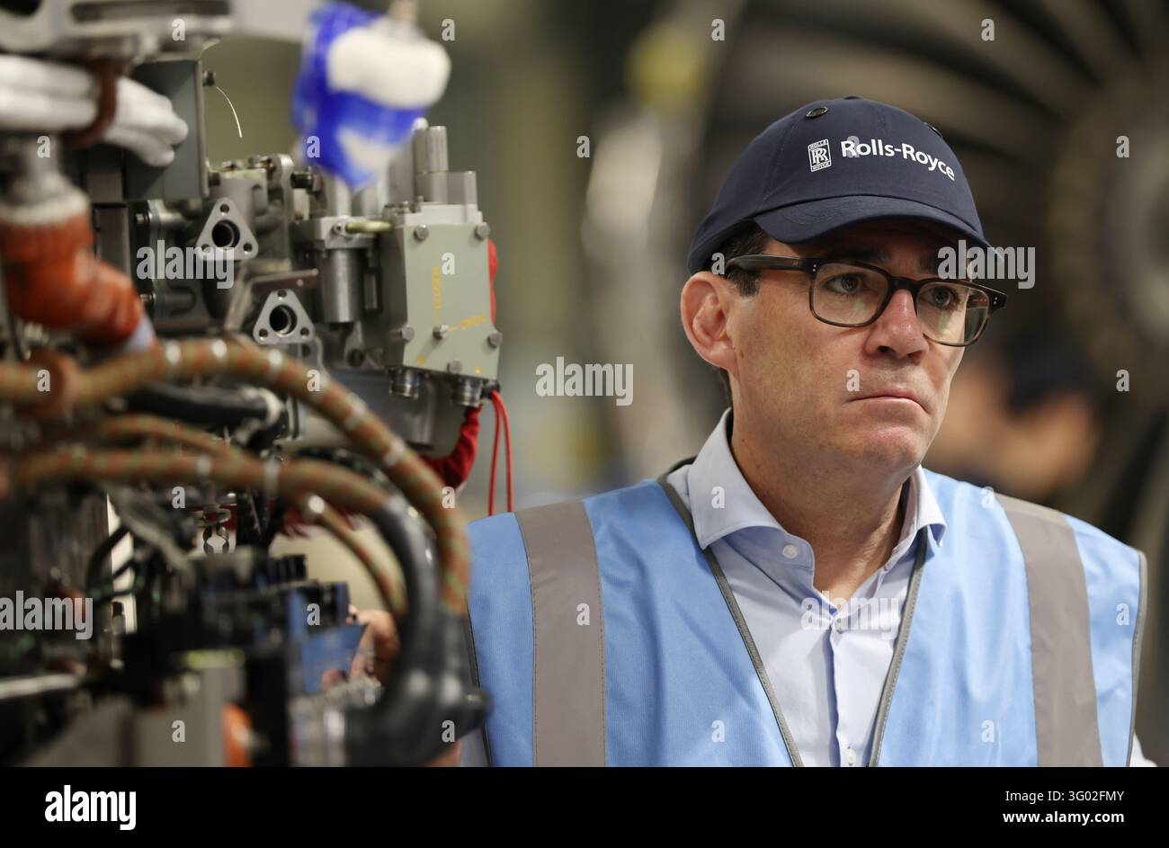 Pool Wiver Britain's Prime Minister Andy Burnham during a visit to the Rolls Royce ...