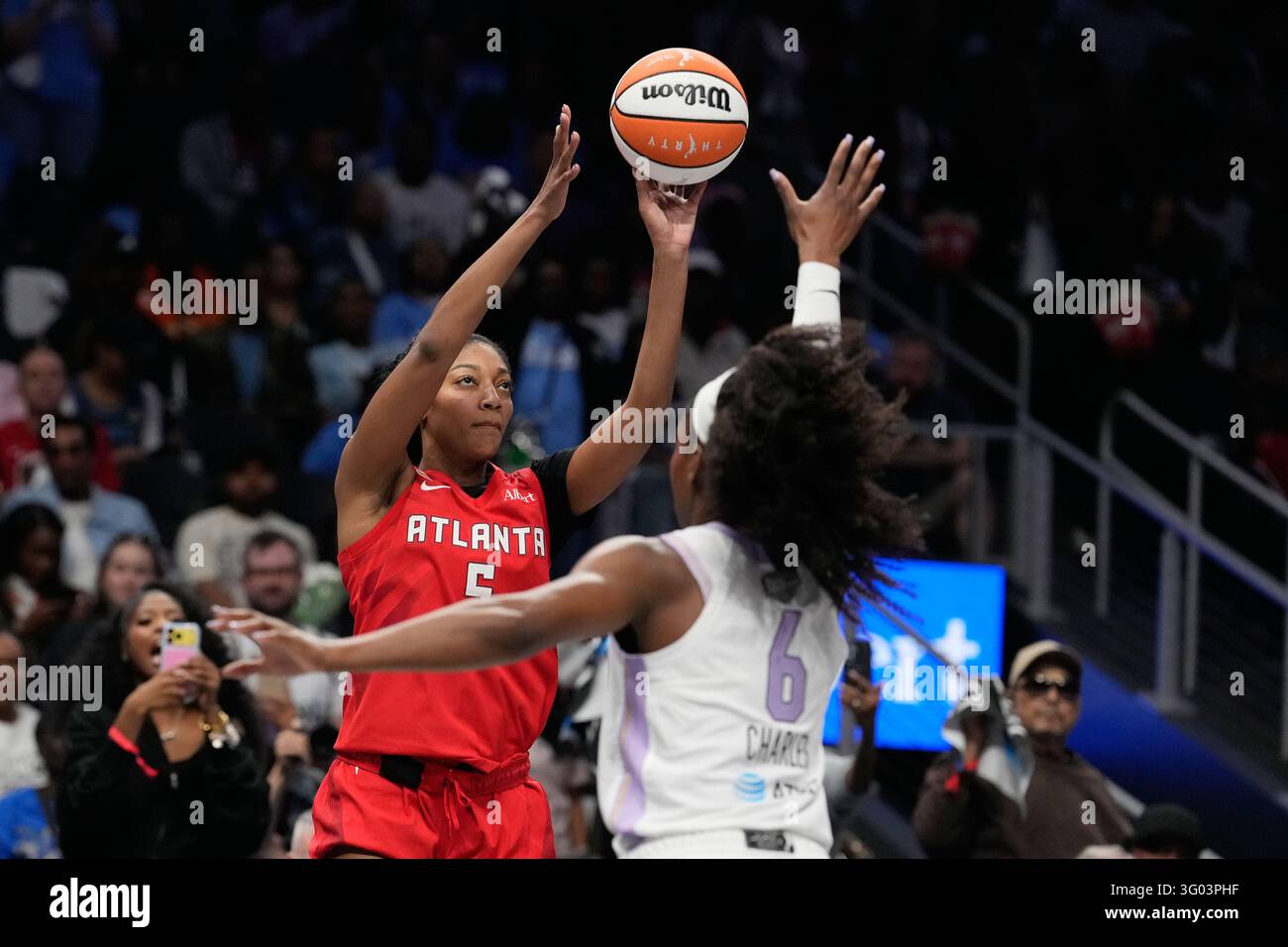 Angle Rese Atlanta Dream's Angel Reese, left, goes up to shoot against Golden ...