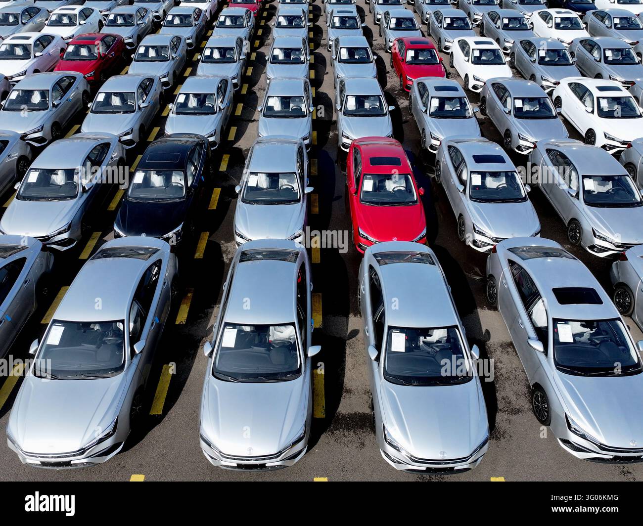 Aerial view of new vehicles waiting for shipment to overseas markets in ...