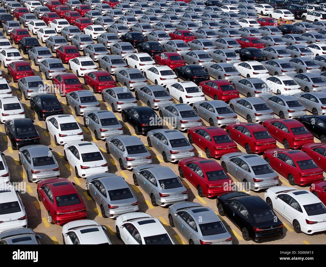 Aerial view of new vehicles waiting for shipment to overseas markets in ...