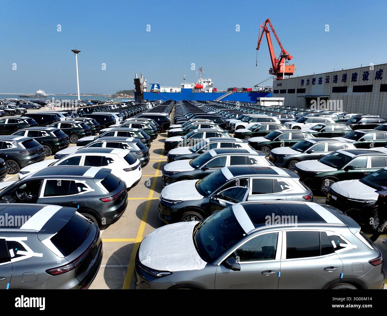 Aerial view of new vehicles waiting for shipment to overseas markets in ...