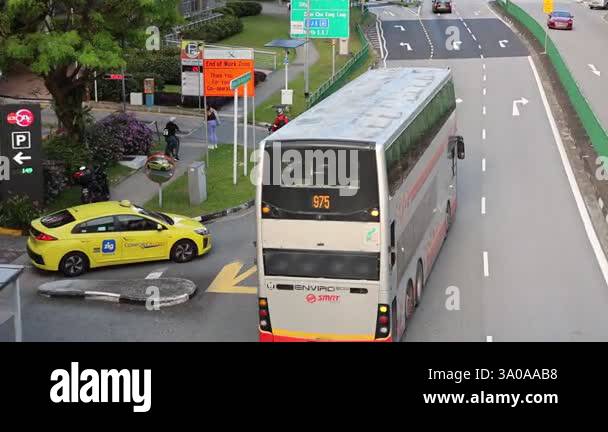Singapore-02 Mat, 2025: SMRT bus travel on Singapore street. SMRT Buses ...