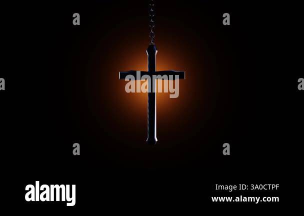 Christian Cross Hanging from Chain and Swinging Over Glowing Background ...
