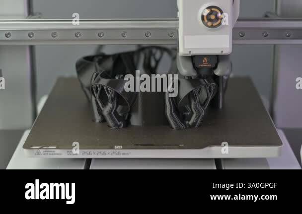 3D printer prints an object. The process of printing model on 3D ...