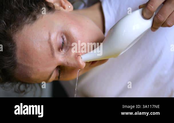 nasal-irrigation-also-known-as-nasal-lavage-or-nasal-washing-is-a-personal-hygiene-practice-in-which-the-nasal-cavity-is-washed-to-flush-out-mucus-and-debris-from-the-nose-and-sinuses-3a117ne.jpg