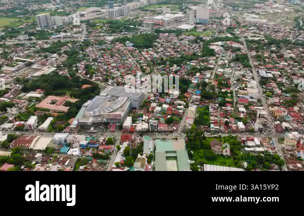 Panay View Top view of commercial buildings surrounded by busy highways with cars ...