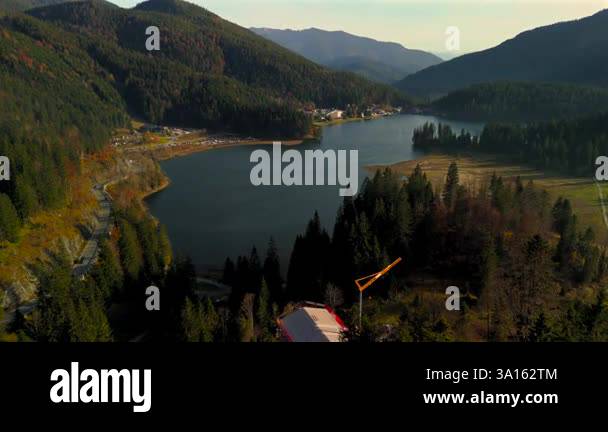 Aerial view of Lake Spitzingsee in Bavarian Alps on sunny autumn day ...